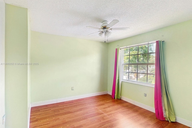 15141 SW 46th St, Miramar, FL 33027 - unfurnished room with light wood-type flooring, a textured ceiling, and ceiling fan