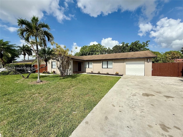 5506 SW 134th Pl, Miami, FL 33175 - view of front of home with a garage, stucco siding, and driveway
