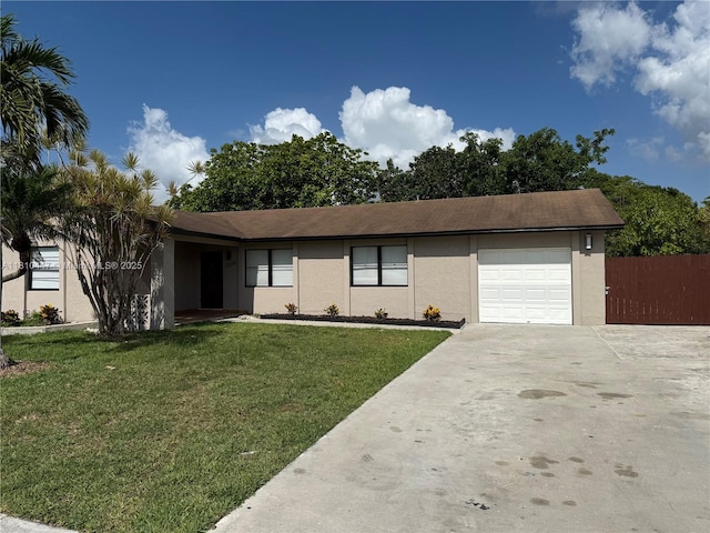 5506 SW 134th Pl, Miami, FL 33175 - view of front facade with an attached garage, stucco siding, and concrete driveway