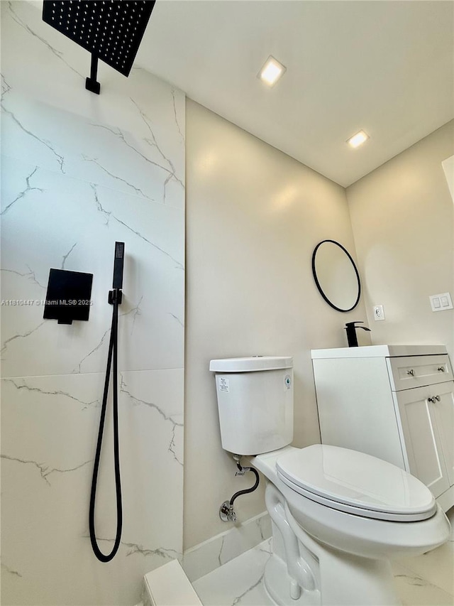 5506 SW 134th Pl, Miami, FL 33175 - bathroom with marble finish flooring, toilet, vanity, baseboards, and recessed lighting