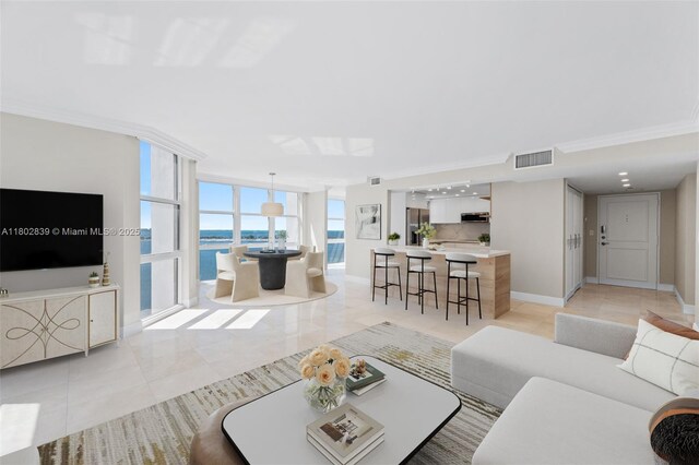 1901 Brickell Ave Unit B1114, Miami, FL 33129 - living room featuring light tile patterned floors and a water view