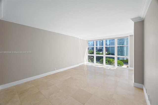 1901 Brickell Ave Unit B1114, Miami, FL 33129 - unfurnished room featuring crown molding, baseboards, and floor to ceiling windows