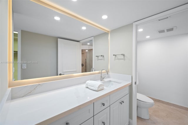1901 Brickell Ave Unit B1114, Miami, FL 33129 - bathroom with vanity, recessed lighting, and a shower with shower door