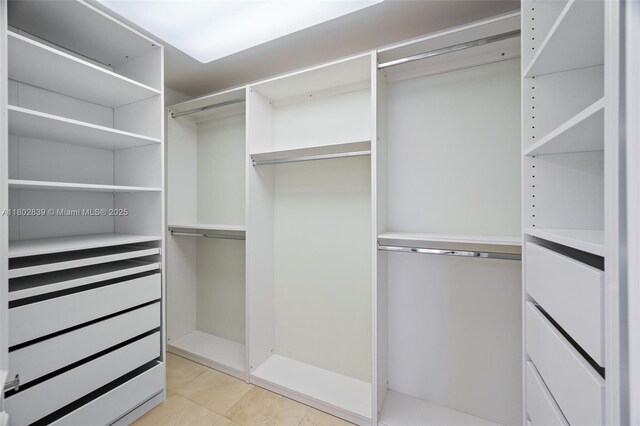 1901 Brickell Ave Unit B1114, Miami, FL 33129 - walk in closet with light tile patterned floors