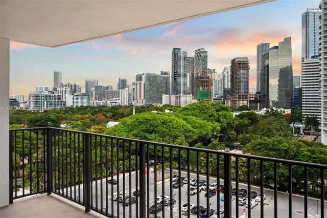 1901 Brickell Ave Unit B1114, Miami, FL 33129 - balcony at dusk featuring a skyline view
