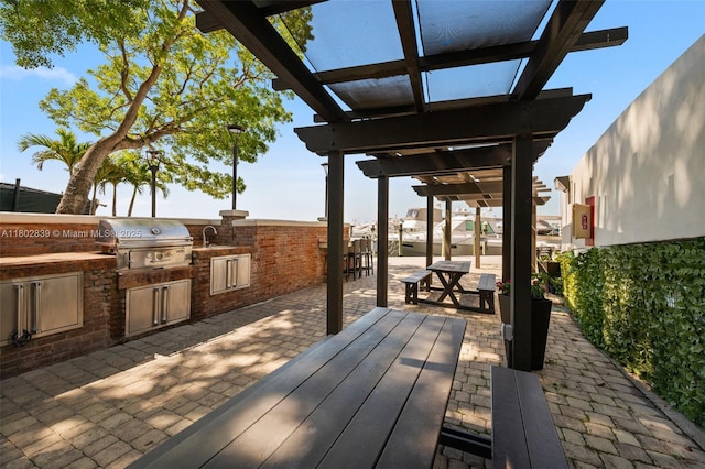 1901 Brickell Ave Unit B1114, Miami, FL 33129 - deck featuring a patio area, a sink, and a pergola
