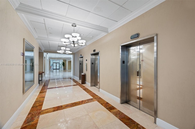 1901 Brickell Ave Unit B1114, Miami, FL 33129 - hall featuring elevator, crown molding, baseboards, tile patterned floors, and inlaid floor details