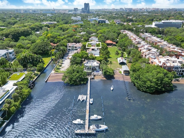 3169 Via Abitare Way Unit 6, Miami, FL 33133 - view of property location featuring nearby urban area, a large body of water, and a tree filled landscape