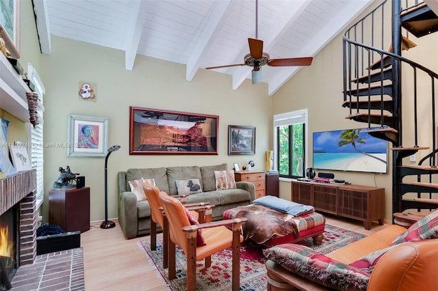 3169 Via Abitare Way Unit 6, Miami, FL 33133 - living room with light wood-style floors, stairway, a fireplace, and ceiling fan