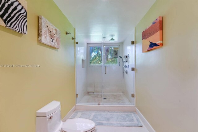 3169 Via Abitare Way Unit 6, Miami, FL 33133 - full bath featuring toilet, a shower stall, and baseboards