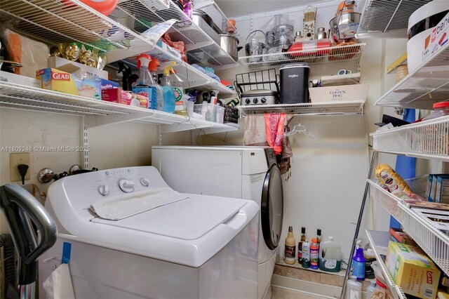 3169 Via Abitare Way Unit 6, Miami, FL 33133 - washroom featuring washer and dryer