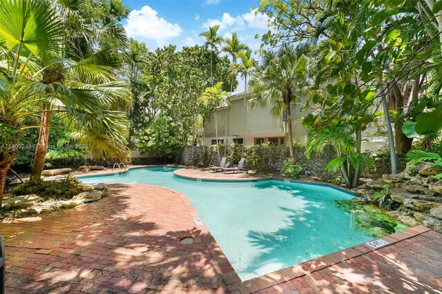 3169 Via Abitare Way Unit 6, Miami, FL 33133 - community pool featuring a patio