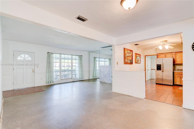 7211 Plantation Blvd, Miramar, FL 33023 - unfurnished living room featuring a ceiling fan