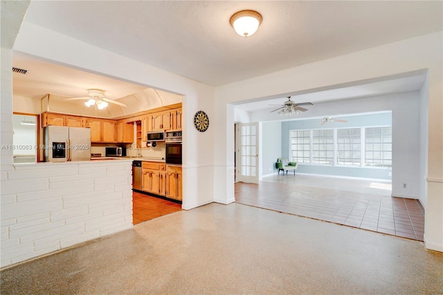 7211 Plantation Blvd, Miramar, FL 33023 - kitchen with stainless steel appliances, a ceiling fan, light countertops, and open floor plan
