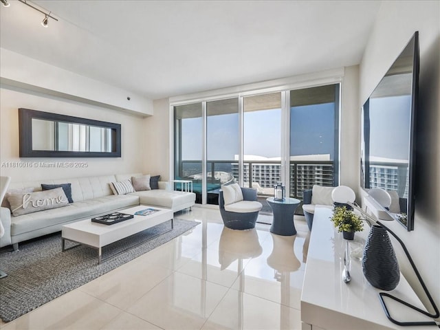1830 S Ocean Dr Unit 5009, Hallandale Beach, FL 33009 - living area featuring tile patterned floors and a wall of windows