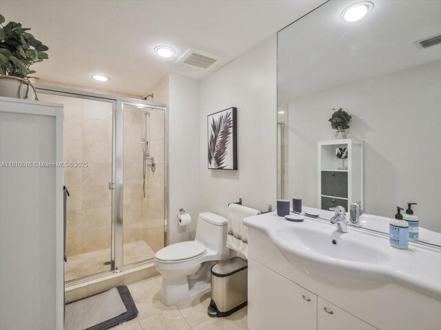1830 S Ocean Dr Unit 5009, Hallandale Beach, FL 33009 - bathroom with toilet, vanity, a shower stall, recessed lighting, and tile patterned floors