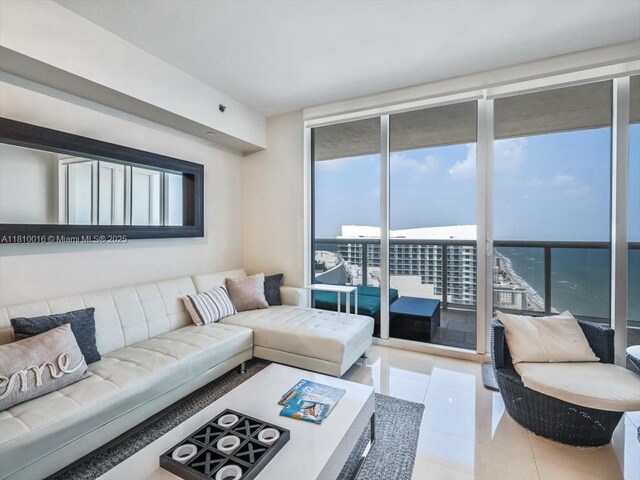 1830 S Ocean Dr Unit 5009, Hallandale Beach, FL 33009 - living room featuring a wall of windows, plenty of natural light, and light tile patterned floors