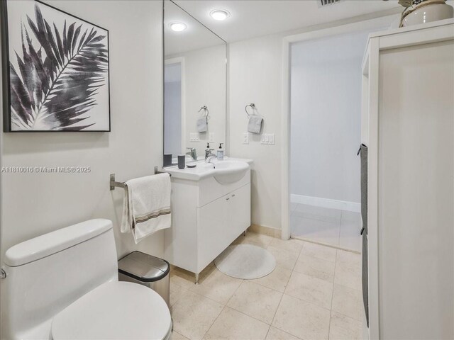1830 S Ocean Dr Unit 5009, Hallandale Beach, FL 33009 - bathroom with vanity, toilet, recessed lighting, baseboards, and tile patterned flooring