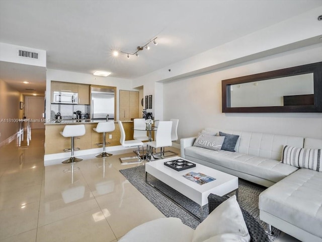 1830 S Ocean Dr Unit 5009, Hallandale Beach, FL 33009 - tiled living area with baseboards