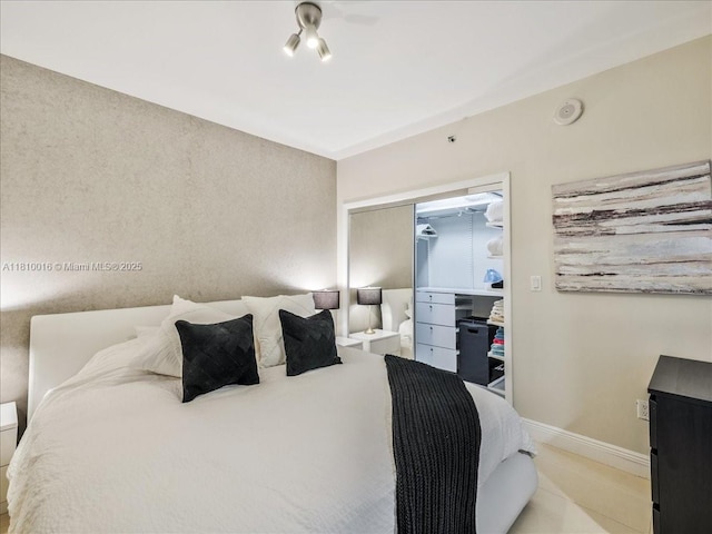 1830 S Ocean Dr Unit 5009, Hallandale Beach, FL 33009 - tiled bedroom featuring baseboards