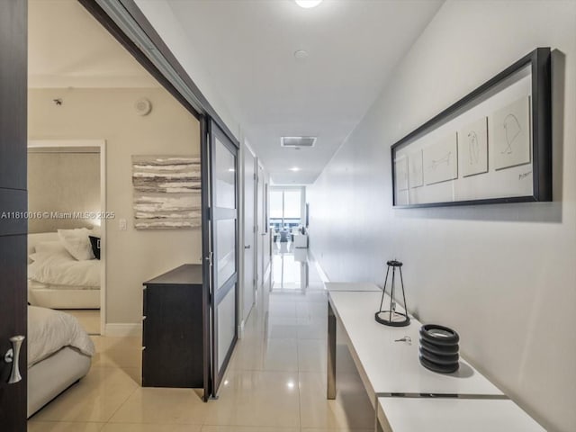 1830 S Ocean Dr Unit 5009, Hallandale Beach, FL 33009 - hallway with light tile patterned floors and baseboards