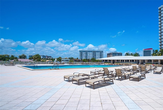1985 S Ocean Dr Unit 17D, Hallandale Beach, FL 33009 - community pool featuring a patio area