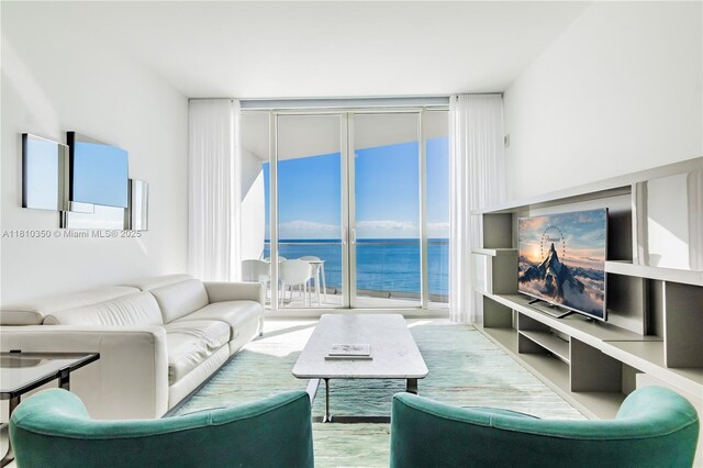 16901 Collins Ave Unit 2504, Sunny Isles Beach, FL 33160 - living area featuring expansive windows and wood finished floors