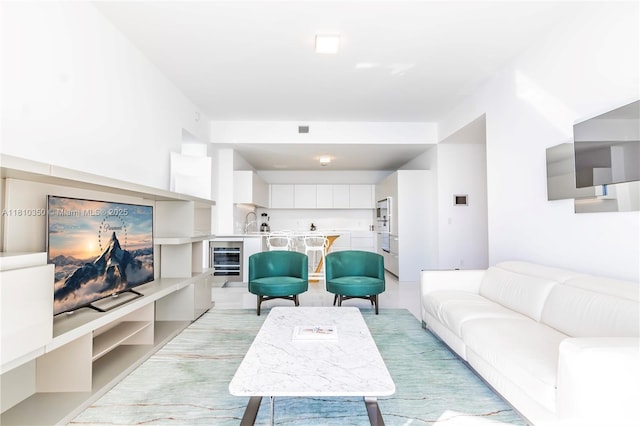 16901 Collins Ave Unit 2504, Sunny Isles Beach, FL 33160 - living room featuring wine cooler and light wood-style flooring