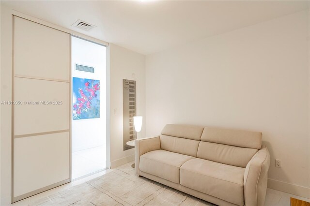 16901 Collins Ave Unit 2504, Sunny Isles Beach, FL 33160 - sitting room featuring baseboards