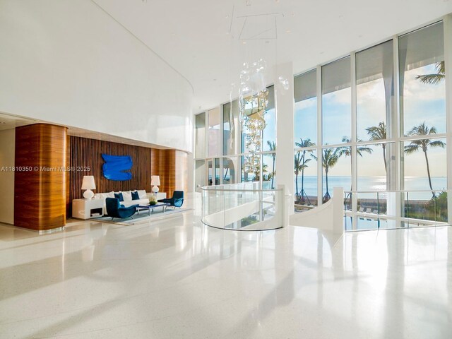 16901 Collins Ave Unit 2504, Sunny Isles Beach, FL 33160 - community lobby with a water view and a wall of windows
