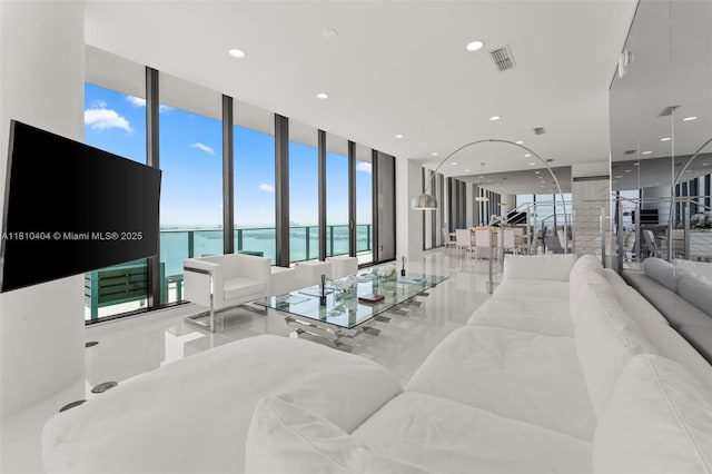 3131 NE 7th Ave Unit Uph5303, Miami, FL 33137 - living area featuring expansive windows and recessed lighting