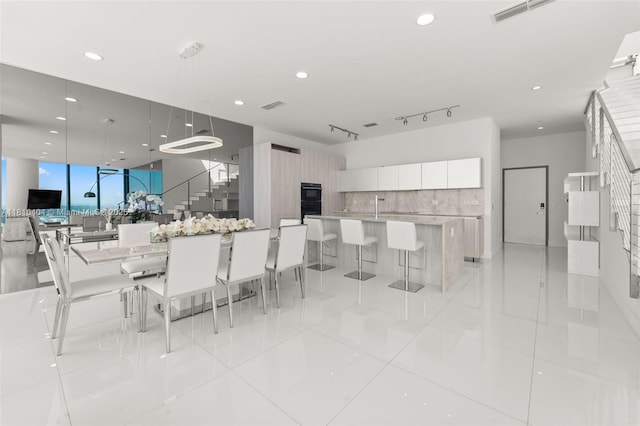 3131 NE 7th Ave Unit Uph5303, Miami, FL 33137 - dining space featuring recessed lighting and light tile patterned floors