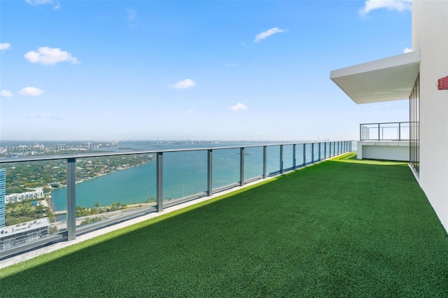3131 NE 7th Ave Unit Uph5303, Miami, FL 33137 - view of green lawn with a water view and a balcony