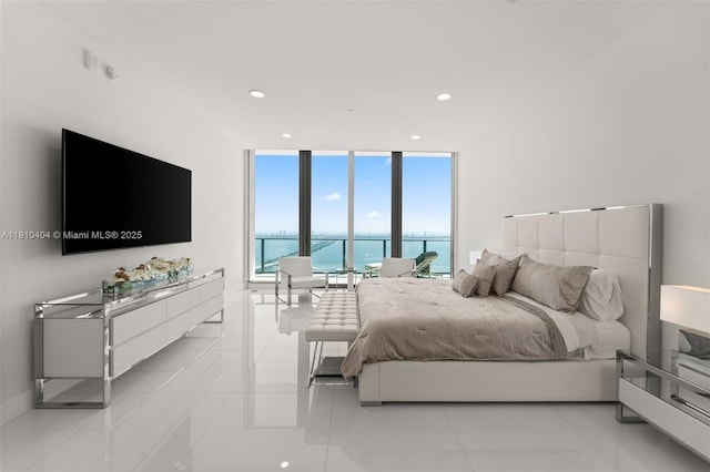 3131 NE 7th Ave Unit Uph5303, Miami, FL 33137 - bedroom with floor to ceiling windows, recessed lighting, and light tile patterned flooring