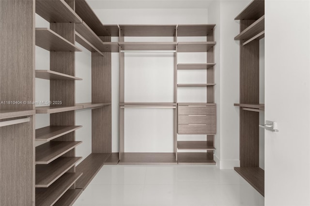 3131 NE 7th Ave Unit Uph5303, Miami, FL 33137 - spacious closet with tile patterned floors