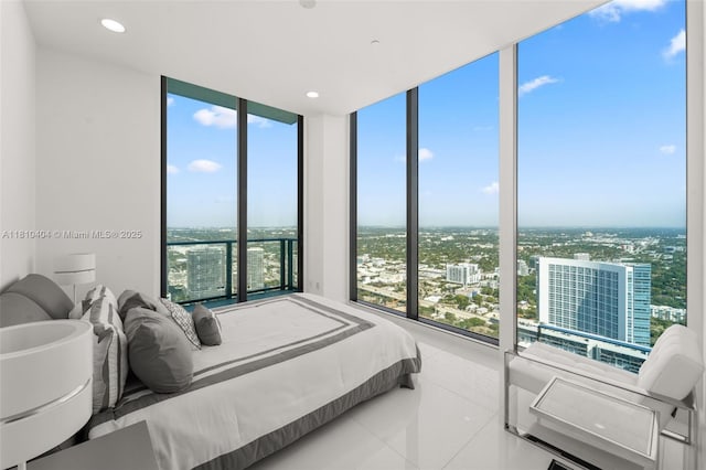 3131 NE 7th Ave Unit Uph5303, Miami, FL 33137 - bedroom with floor to ceiling windows, a view of city, and tile patterned floors