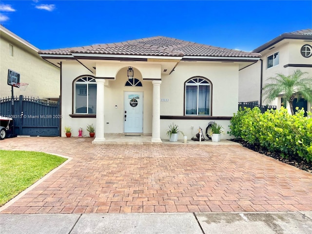 15333 SW 40th Ter, Miami, FL 33185 - mediterranean / spanish-style home with a tile roof and stucco siding