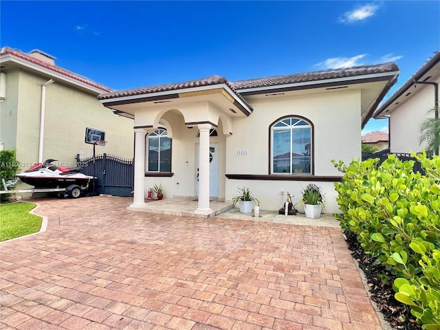 15333 SW 40th Ter, Miami, FL 33185 - mediterranean / spanish-style home featuring a tile roof and stucco siding