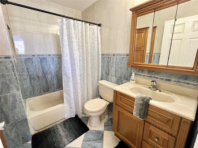 15333 SW 40th Ter, Miami, FL 33185 - bathroom with tile walls, toilet, shower / bath combo with shower curtain, and vanity