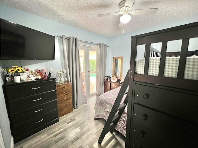 15333 SW 40th Ter, Miami, FL 33185 - bedroom with access to outside, light wood-type flooring, a textured ceiling, and a ceiling fan