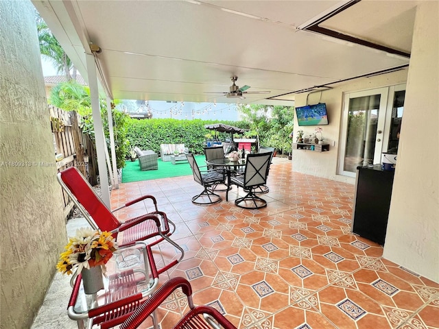 15333 SW 40th Ter, Miami, FL 33185 - view of patio / terrace featuring french doors, ceiling fan, and outdoor dining area