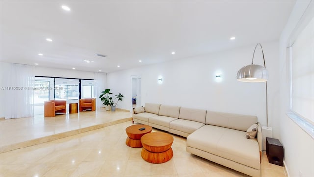 19140 N Bay Rd, Sunny Isles Beach, FL 33160 - living room featuring light tile patterned floors and recessed lighting
