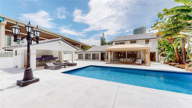 19140 N Bay Rd, Sunny Isles Beach, FL 33160 - outdoor pool with an outdoor living space, a patio area, a gazebo, and exterior bar