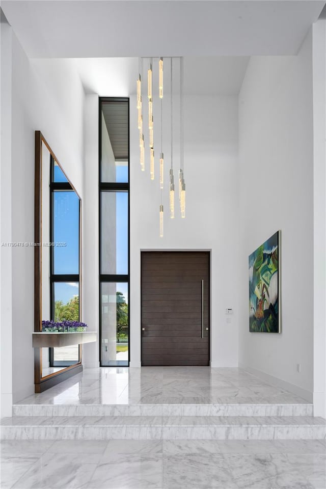 12331 SW 2nd St, Plantation, FL 33325 - entryway featuring marble tiled floors and a towering ceiling