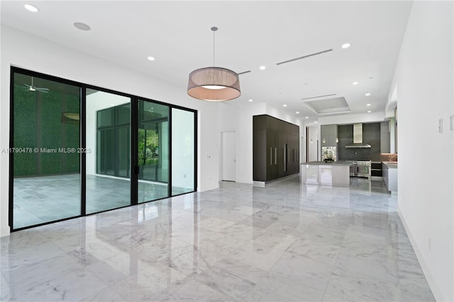12331 SW 2nd St, Plantation, FL 33325 - unfurnished living room featuring light marble finish flooring, recessed lighting, and baseboards