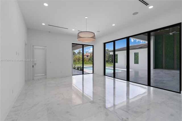 12331 SW 2nd St, Plantation, FL 33325 - unfurnished room with light marble finish flooring, recessed lighting, and baseboards
