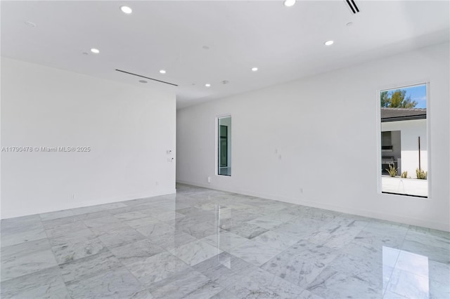 12331 SW 2nd St, Plantation, FL 33325 - empty room with recessed lighting, light marble finish flooring, and baseboards