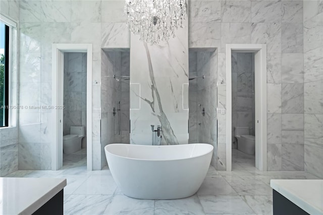 12331 SW 2nd St, Plantation, FL 33325 - full bathroom featuring toilet, tile walls, vanity, a freestanding bath, and marble tiled floors