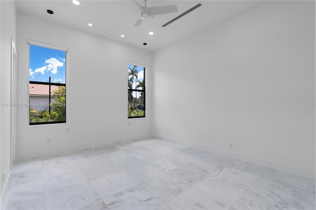 12331 SW 2nd St, Plantation, FL 33325 - unfurnished room with recessed lighting, plenty of natural light, baseboards, and light marble finish floors
