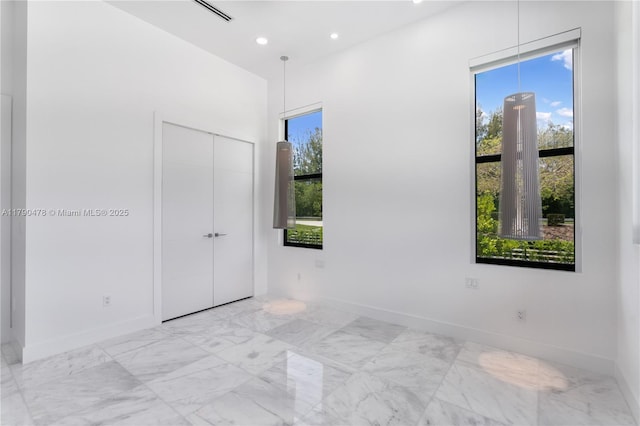 12331 SW 2nd St, Plantation, FL 33325 - empty room with marble finish flooring, baseboards, and recessed lighting